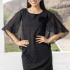 Vestido de fiesta negro con brillo dorado modelo Luz Salomé detalle del diseño elegante