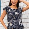 Enterizo Zoe mujer dos piezas color negro floral, detalle de blusa con botones decorativos laterales | Salomé Perú