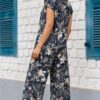 Vista posterior del Enterizo Zoe mujer dos piezas color negro floral con pantalón palazo | Salomé Perú